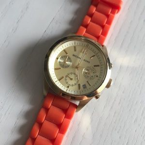 Orange silicon band MK watch with gold details